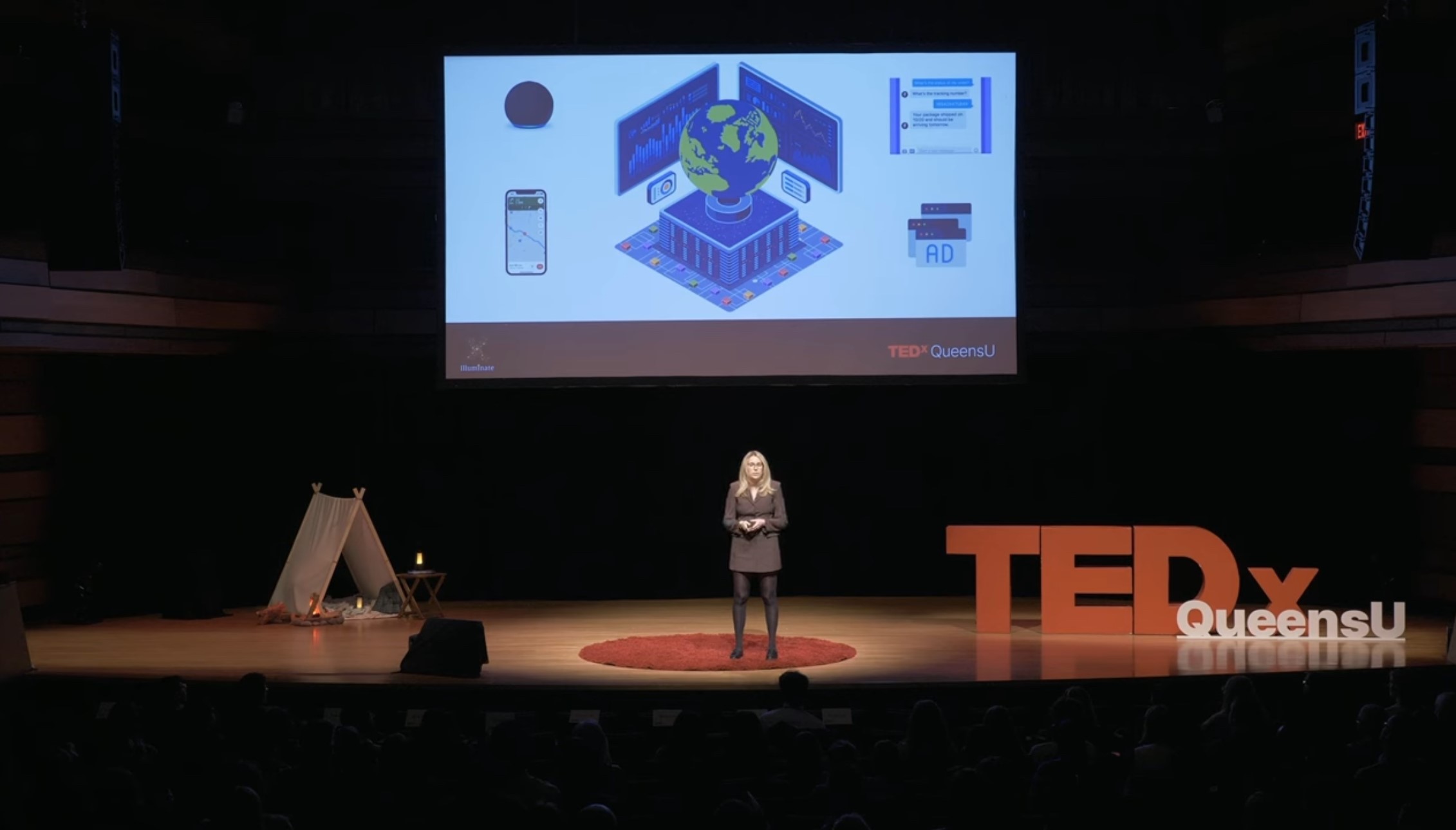 Kelsey delivers her talk on stage
